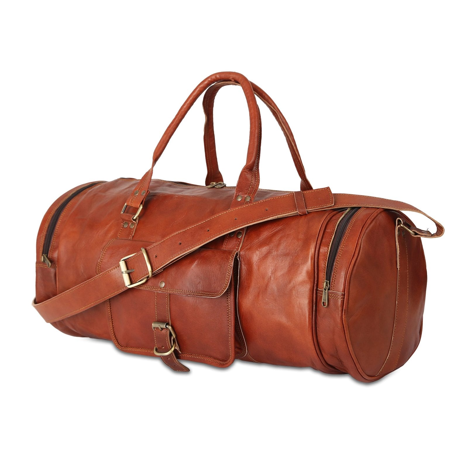 A brown, round leather travel duffle bag with a shoulder strap, side pockets, and a front pocket. The bag is constructed with canvas lining and appears to be made from genuine leather.