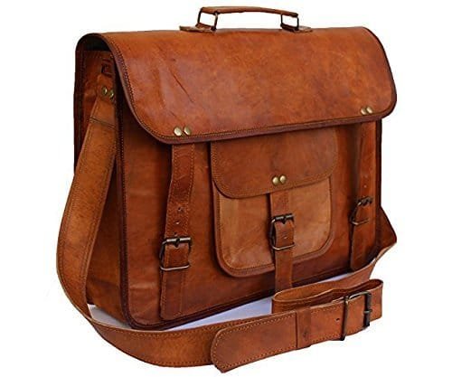 A vintage tan brown genuine leather laptop & messenger bag with a shoulder strap, front pocket, and buckle closure.
