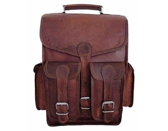 A dark brown leather backpack with multiple compartments and buckle closures.