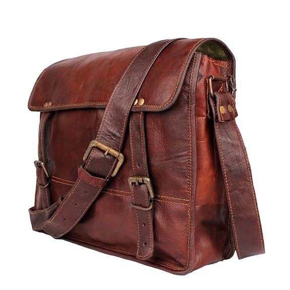 A Mahogany brown leather office bag with a shoulder strap and buckle closures
