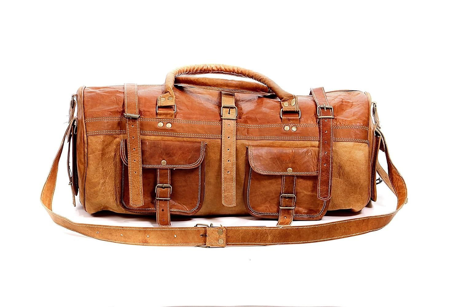 A vintage brown leather duffle bag with a shoulder strap and multiple outer pockets.